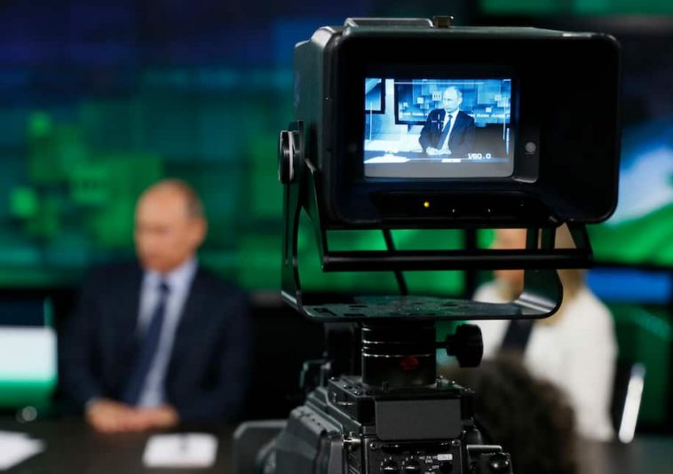 Russian President Vladimir Putin on the RT television network. (Reuters)